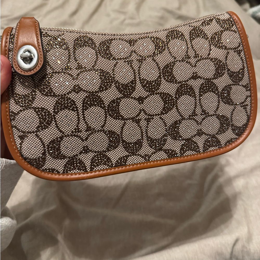 LARGER COACH CRYSTAL SWINGER REGULAR SIZE W/ LEATHER STRAP
